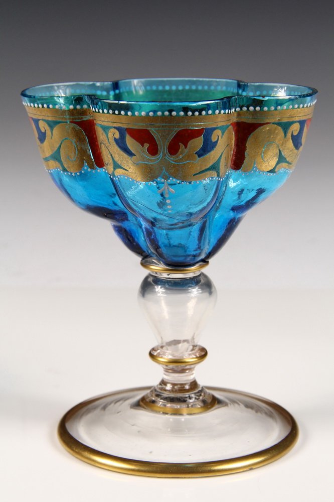 HARRACH ART GLASS - Bohemian Renaissance Revival: HARRACH ART GLASS - Bohemian Renaissance Revival Sherbet Glass in aqua blue with gilt and polychrome enamel band, four-lobed bowl. 4 1/2" tall. Fine condition.