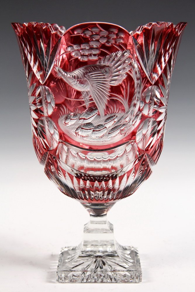CZECH ART GLASS - Bohemian Cranberry Cut to Clear: CZECH ART GLASS - Bohemian Cranberry Cut to Clear Pedestal Vase by Carl Goldberg, signed on base, featuring game birds and starbursts. Circa 1900. 11 1/2" tall, 7 3/4" diam.