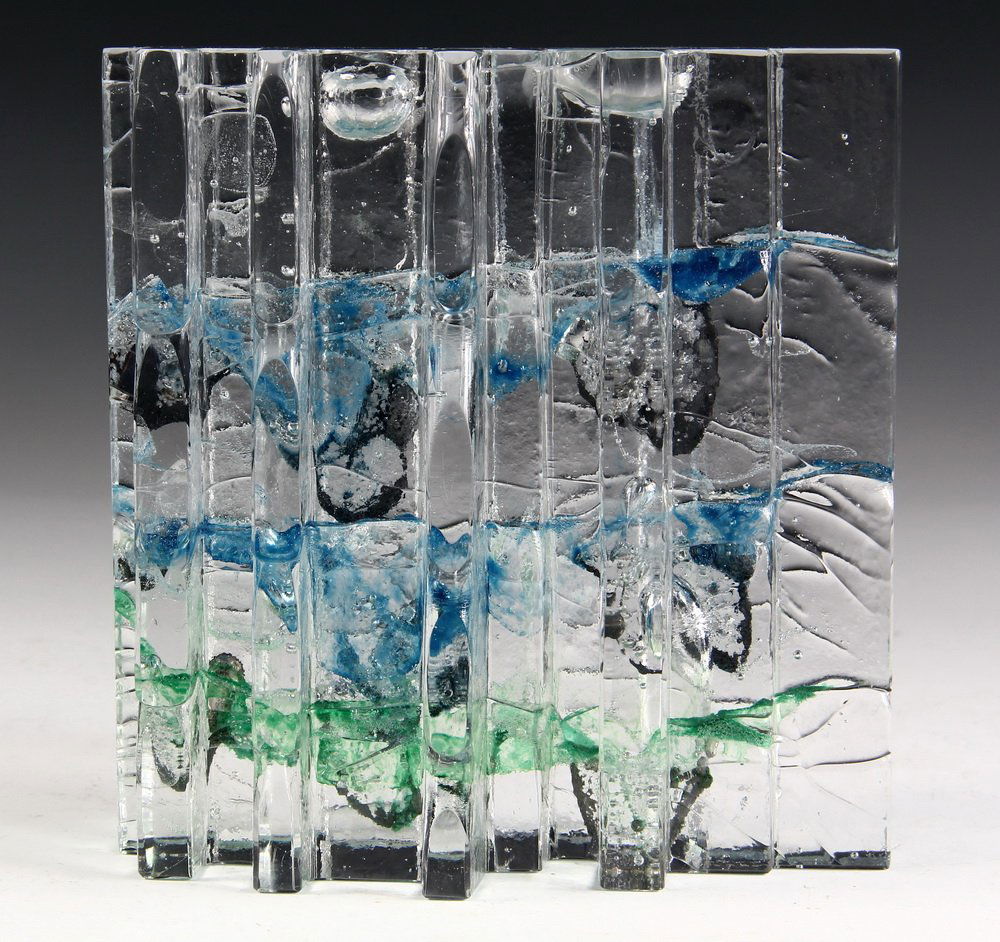 GLASS SCULPTURE - Forest Series, circa 1960 by Helena: GLASS SCULPTURE - Forest Series, circa 1960 by Helena Tynell (Finnish, 1918 -), signed and marked 'Rihimaen Lasi Oy'. A solid casting with striations of color. 6 3/4" x 6 3/8" x 3 1/4". Fine condition