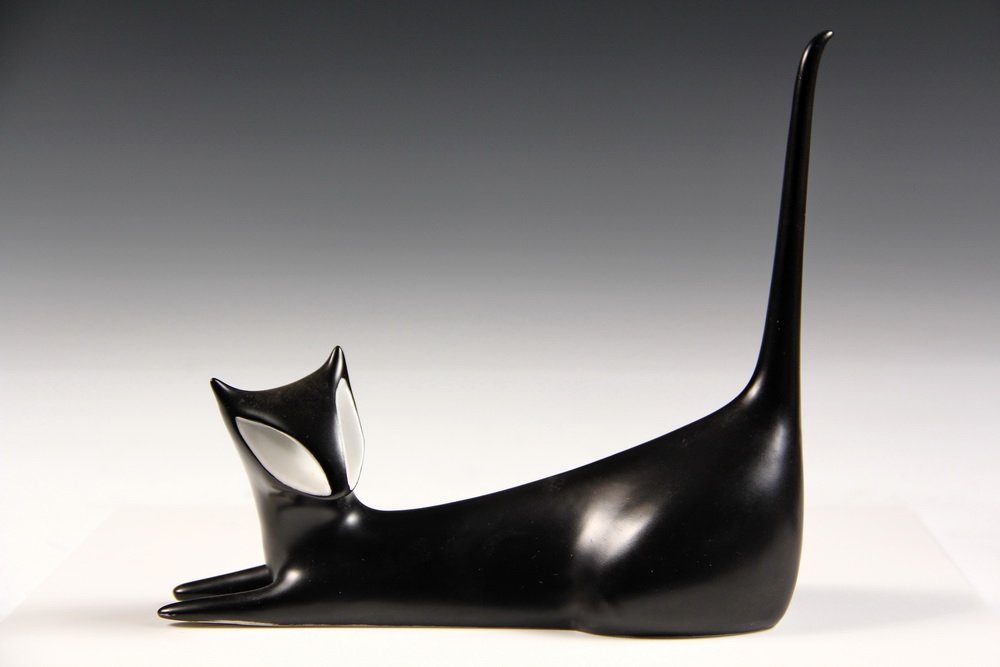 PORCELAIN FIGURE - Reclining Cat by Royal Dux,: PORCELAIN FIGURE - Reclining Cat by Royal Dux, Czechoslovakia. 7 3/8" long. Fine condition.