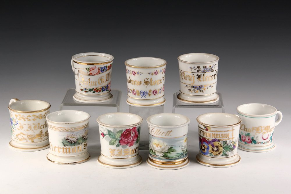 (9) HANDPAINTED FLORAL SHAVING MUGS W/ NAMES - Inc:: (9) HANDPAINTED FLORAL SHAVING MUGS W/ NAMES - Inc: Benj. Record by T&V Limoges; Chas. B Merriman by David O Ford; GR Elliot, unmarked; John G Weinhardt by T&V; Andrew Storz, unmarked; LF Sheeran by T