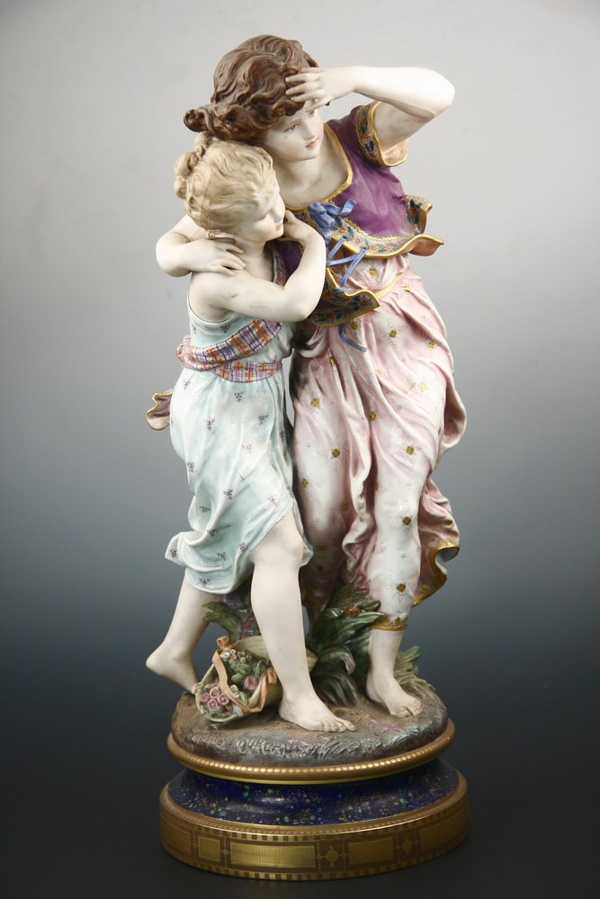 BISQUE PORCELAIN FIGURAL GROUP - 'Deux Jeunes Filles: BISQUE PORCELAIN FIGURAL GROUP - 'Deux Jeunes Filles Marchant Au Vent' by Hippolyte Francois Moreau (French, 1832-1927), signed on base, depicting two girls in light summer dresses running into a stif