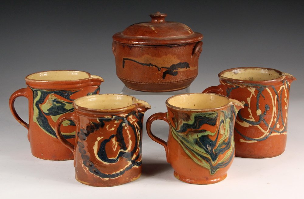 (5 PCS) JASPE POTTERY - French Provencial Country: (5 PCS) JASPE POTTERY - French Provencial Country Antique Blue & Cream on Red Jaspe Covered Bowl & (4) Pitchers. 5 1/4" to 5 1/2" tall. Glaze flakes, rim and spout chips.