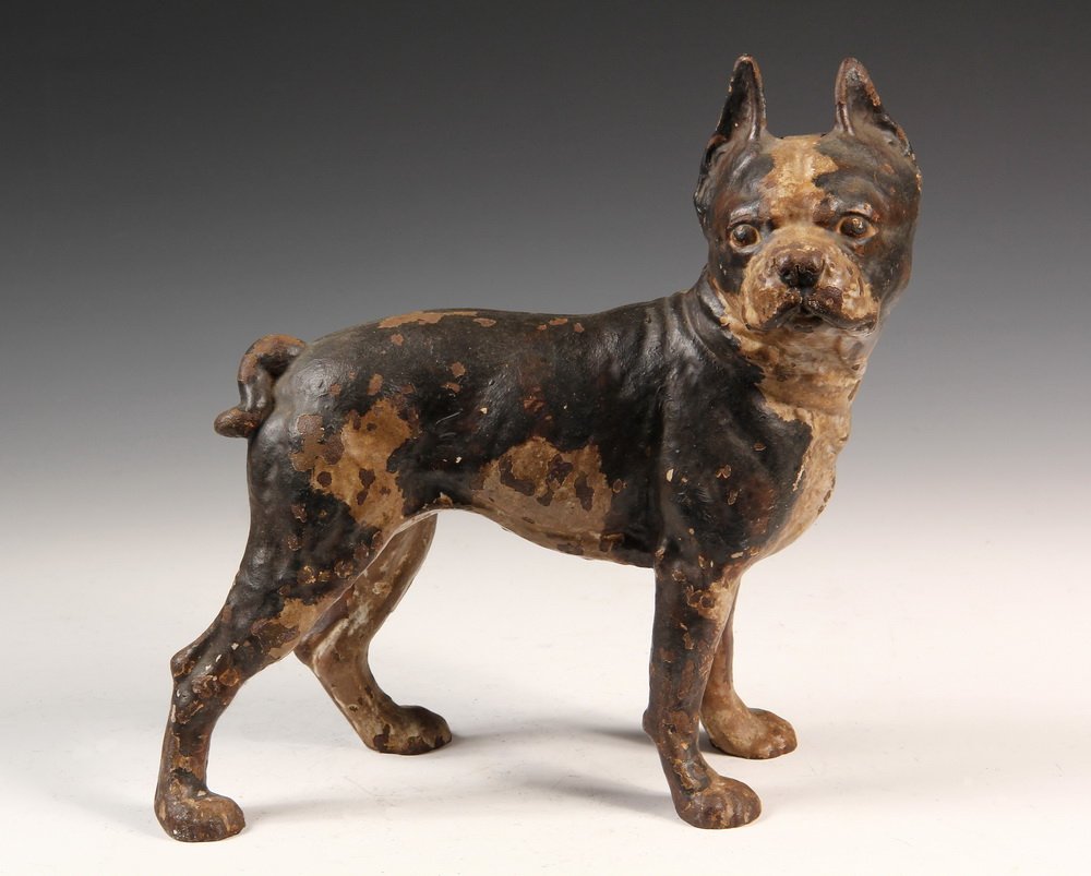 FIGURAL CAST IRON DOORSTOP - Standing Boston Bulldog: FIGURAL CAST IRON DOORSTOP - Standing Boston Bulldog Door Stop in black & white painted cast iron, unmarked, circa 1900. 10" long. Loss to paint, nice age patina.