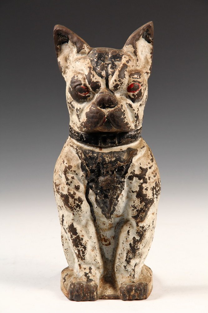 FIGURAL CAST IRON DOORSTOP - Seated Boston Terrier Dog,: FIGURAL CAST IRON DOORSTOP - Seated Boston Terrier Dog, hollow back, with wedge flange, in black & white paint. Circa 1910. 11 1/2" tall. Losses to paint.