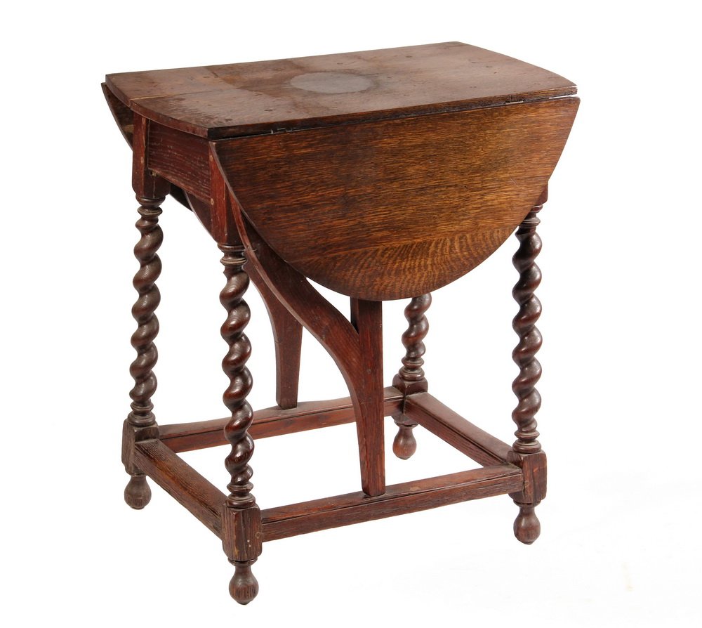 ENGLISH OAK BUTTERFLY TABLE - 19th c. Copy of Jacobean: ENGLISH OAK BUTTERFLY TABLE - 19th c. Copy of Jacobean Oval Top Dropleaf Table with barley twist canted legs, ball feet, pivoting swan neck supports. 29 1/2" x 35 1/2" x 27" with leaves up. Very good