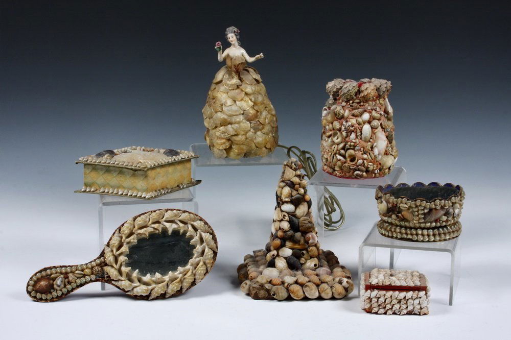 (7 PCS) SHELL ART - 19th c. Sailor Made Folk Art,: (7 PCS) SHELL ART - 19th c. Sailor Made Folk Art, including: Oval hand Mirror; Oval Pin Cushion; Diamond Shaped Box; Shell Lamp (Porcelain Figure w Shell Gown); Vase; Obelisk & Ring Box. 3 1/2" to 10"