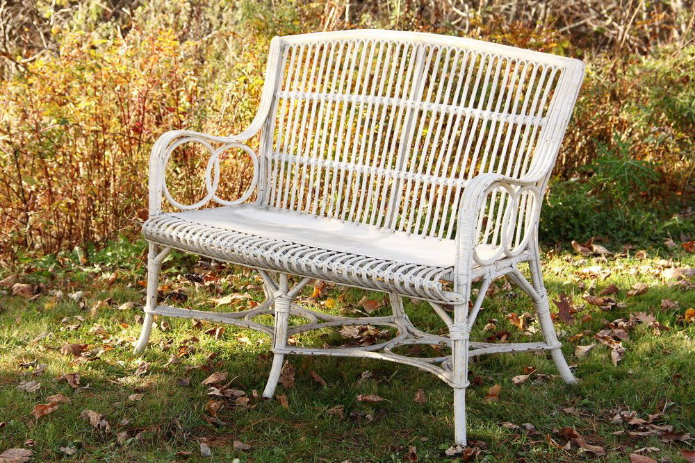 DECO RATTAN SETTEE - Two-Seater in white paint, with: DECO RATTAN SETTEE - Two-Seater in white paint, with inset ring back, arms & stretchers. No cushions. 48" x 37" x 26". Good condition.