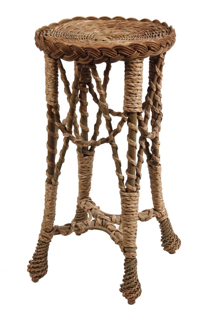 RATTAN STAND - Round Top Four-Legged Stand with: RATTAN STAND - Round Top Four-Legged Stand with seagrass detailing, spiralwork on frame, woven teardrop feet. 25" tall, 14" diam. Good condition.