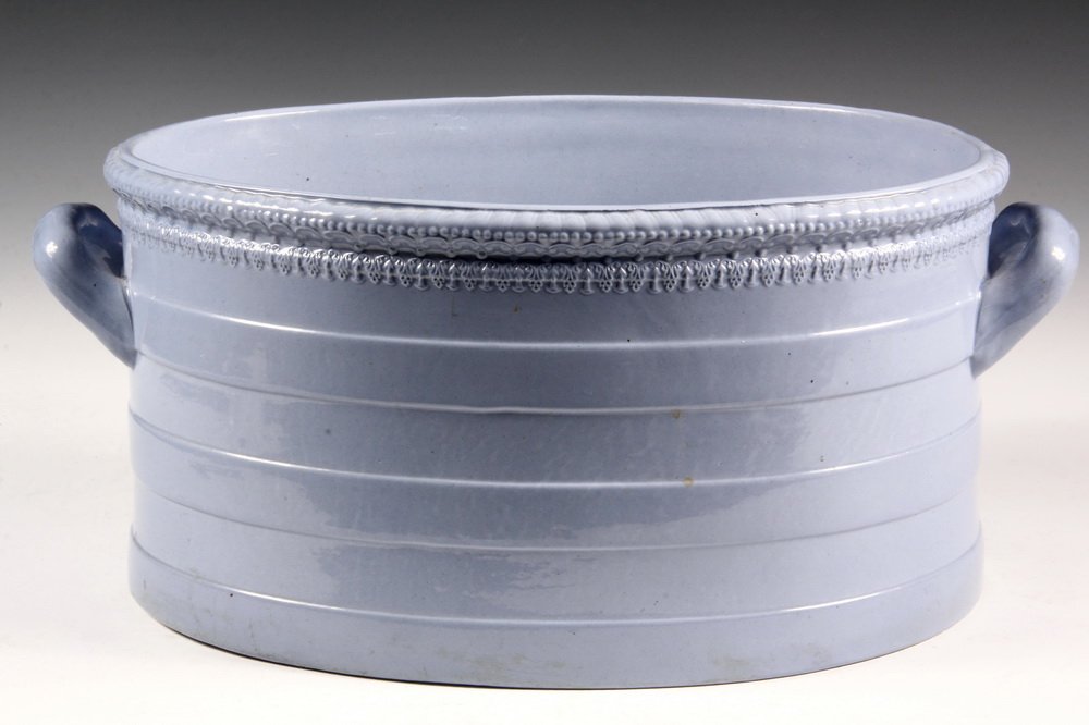 LARGE SPODE FOOTBATH - Pale Blue Oval Footbath with: LARGE SPODE FOOTBATH - Pale Blue Oval Footbath with handles, banding & decorative rim, "SPO-42" impressed on underside. 8" x 18" x 12". Very good condition.
