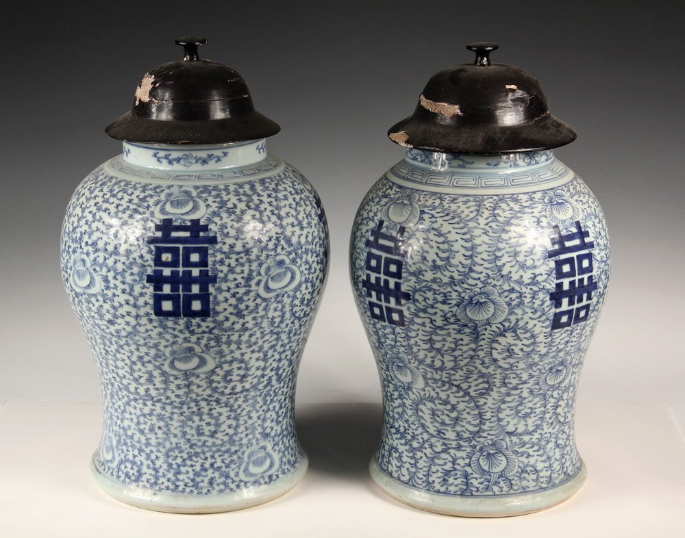 PAIR OF LARGE CHINESE POTTERY JARS - Early 20th c.: PAIR OF LARGE CHINESE POTTERY JARS - Early 20th c. Chinese Blue & White Ginger Jars with fortune characters, overall vine pattern, domed and knopped wooden lids. Both signed. 18 1/4" tall overall, 10"