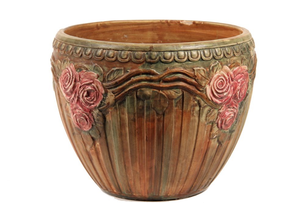 WELLER JARDINIERE - Rose Swag & Drapery Pot with egg: WELLER JARDINIERE - Rose Swag & Drapery Pot with egg and dart top rim, in green and brown with pink blossoms. 9" x 11" diam. Very good condition.