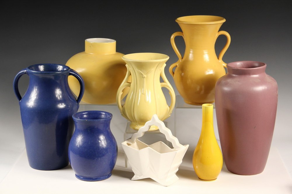 (8) ART POTTERY VASES - All Deco Era, all unmarked: (8) ART POTTERY VASES - All Deco Era, all unmarked except smaller two-handled yellow is McCoy and white basket is Czechoslovakia. 7" to 12" tall. Generally good condition.