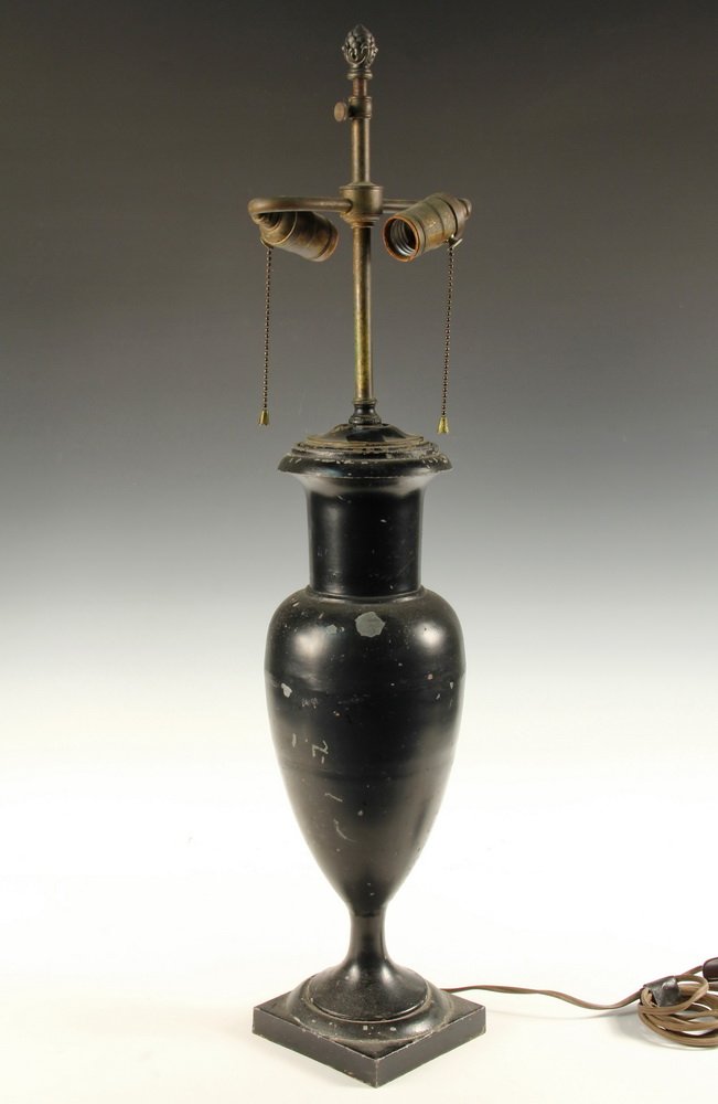 TOLE PAINTED LAMP - 1920s Vintage French Pewter Urn: TOLE PAINTED LAMP - 1920s Vintage French Pewter Urn Form Lamp in black paint, with the original bronze fittings, double swan-neck sockets, pineapple finial. 29" tall. Scuffs.