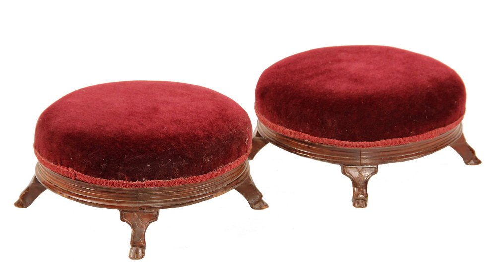 PAIR OF VICTORIAN FOOT STOOLS - Eastlake Low Round Foot: PAIR OF VICTORIAN FOOT STOOLS - Eastlake Low Round Foot Stools with walnut frames, having horse hoof legs, in wine colored mohair upholstery with matching gimp. Rare as a pair. 7" x 14" diam. Scuffs t