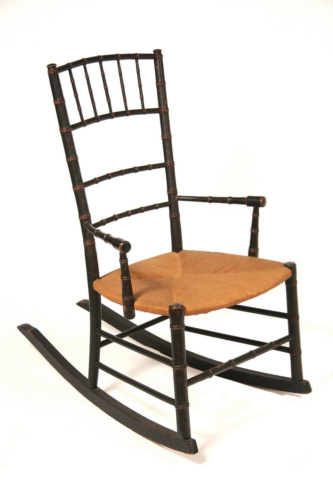 EARLY CHILD'S ROCKER - Circa 1820 Sheraton Period Faux: EARLY CHILD'S ROCKER - Circa 1820 Sheraton Period Faux Bamboo Birdcage Windsor Child's Rocker with later rush seat, half arms, in the original black paint with delicate gold and crimson detailing, 13"