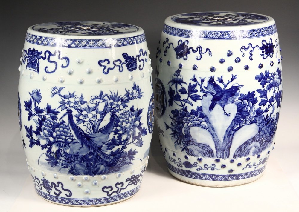 PAIR OF CHINESE GARDEN SEATS - Porcelain Barrel-Form: PAIR OF CHINESE GARDEN SEATS - Porcelain Barrel-Form Seats with pierced tops and sides, raised bosses, blue and white glaze decoration of prunus, peacocks and birds, symbols of fortune in ranks. 19 1/