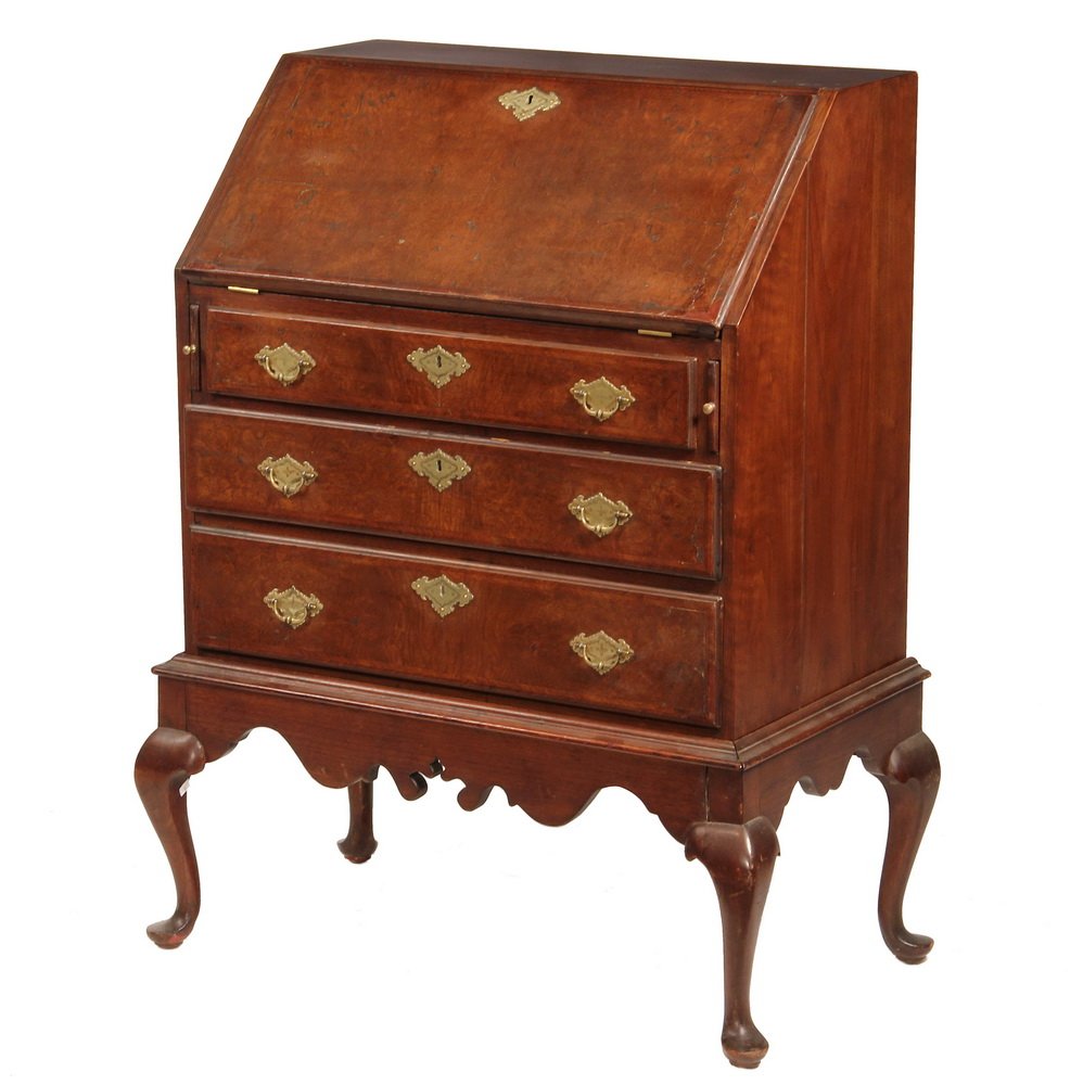 DIMINUTIVE QUEEN ANNE DESK - Lady's Slant Front Desk on: DIMINUTIVE QUEEN ANNE DESK - Lady's Slant Front Desk on Frame in solid walnut, with blocked fan-carved seven drawer interior, valenced slots above. Case holding four burl walnut & herringbone banded d
