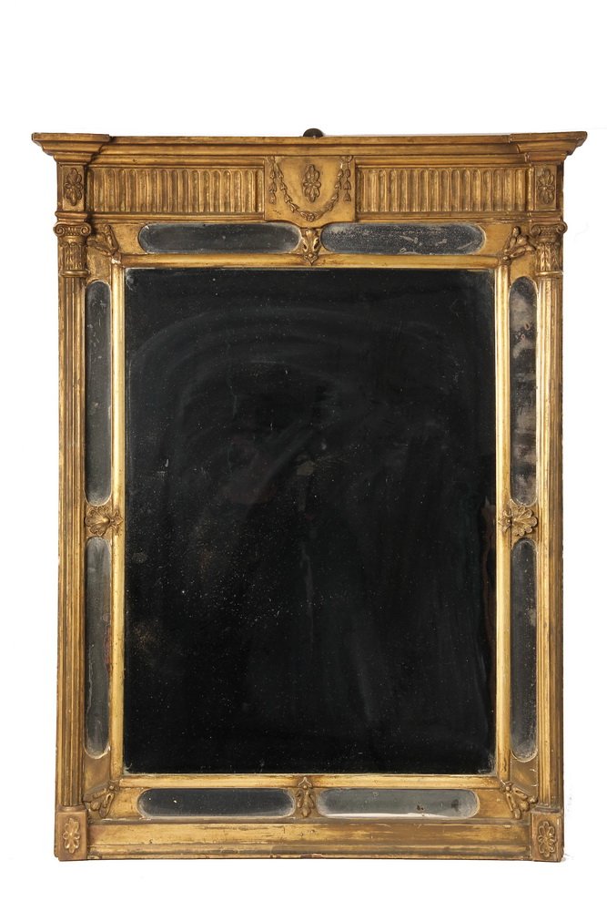 GILT FRAMED CLASSICAL MIRROR - Late 18th to early 19th: GILT FRAMED CLASSICAL MIRROR - Late 18th to early 19th c. French Louis XV Style Carved and Gilt Framed Mirror with old rippled glass, reticulated edge, molded cornice supported by two Corinthian colum