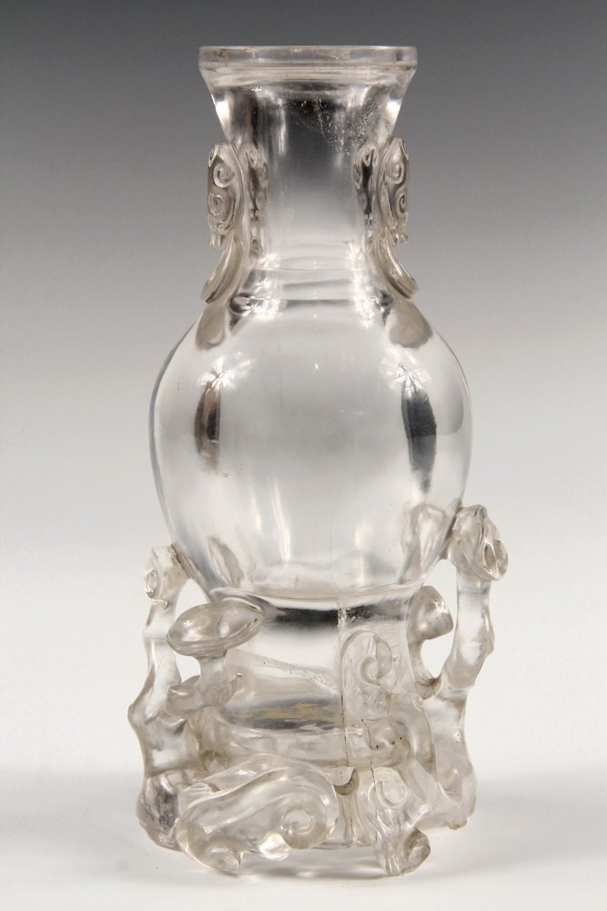 CHINESE ROCK CRYSTAL VASE - Baluster Form Vase with Foo: CHINESE ROCK CRYSTAL VASE - Baluster Form Vase with Foo Lion handles, set on integral Lingzhi fungus stand. 7 1/4" tall. Chips to upper rim, natural inclusion within base of vase.