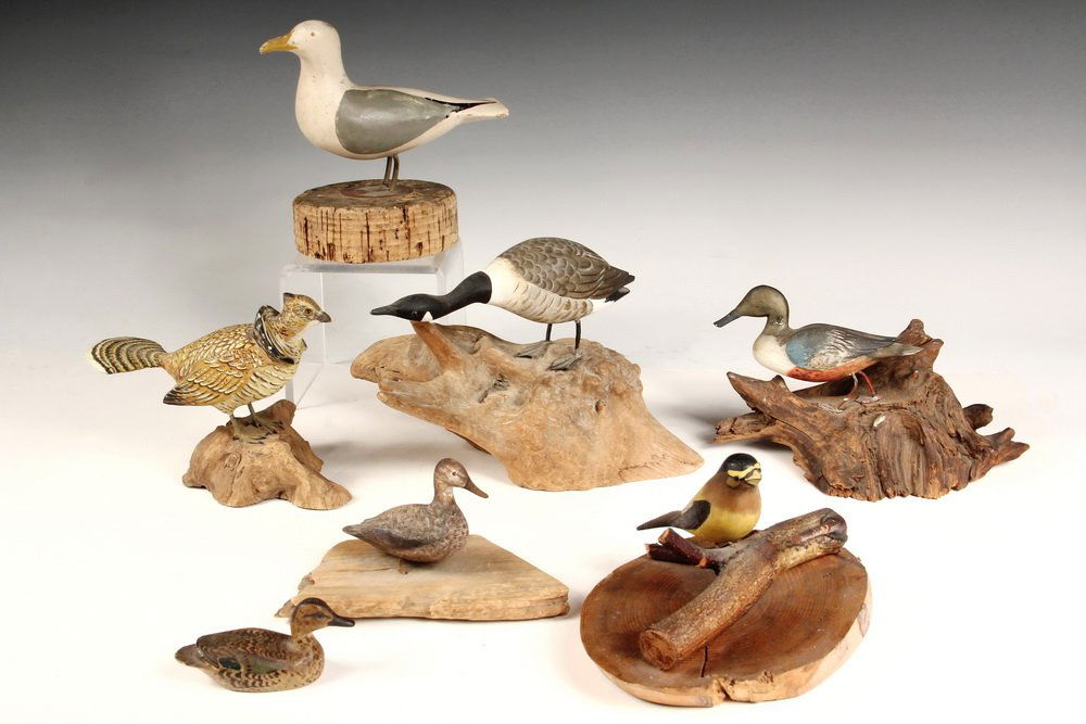 (7) MINIATURE MAINE BIRD CARVINGS - Including: Evening: (7) MINIATURE MAINE BIRD CARVINGS - Including: Evening Grosbeak by Del Higgins of Dexter; Hissing Goose by Robert Morse of Ellsworth; Shoveler Duck by Gerald Robertson of Blue Hill; Gull & Blue Teal b