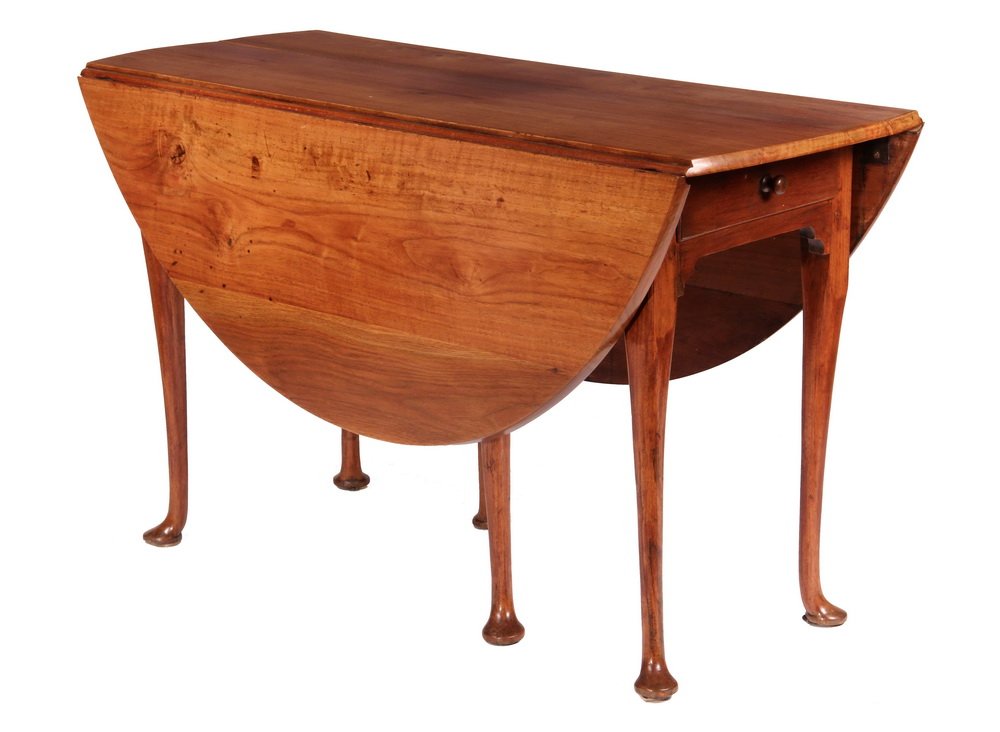 DROPLEAF TABLE - Early 18th c. New England Walnut Oval: DROPLEAF TABLE - Early 18th c. New England Walnut Oval Dropleaf Dining Table set on six Queen Anne legs, swing leg leaf support, drawer at one end. 28" x 47" x 19". 17" leaves. Shrinkage crack to top.