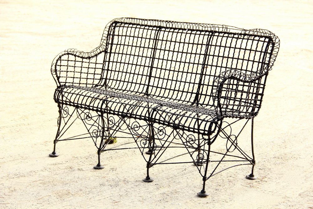 FRENCH WIRE GARDEN SETTEE - 19th c. Heavy Wirework: FRENCH WIRE GARDEN SETTEE - 19th c. Heavy Wirework Three-Seater in black paint, with rolled arms & back, scrollwork brackets, eight legs. 56" x 25" x 35" back. Very good condition.