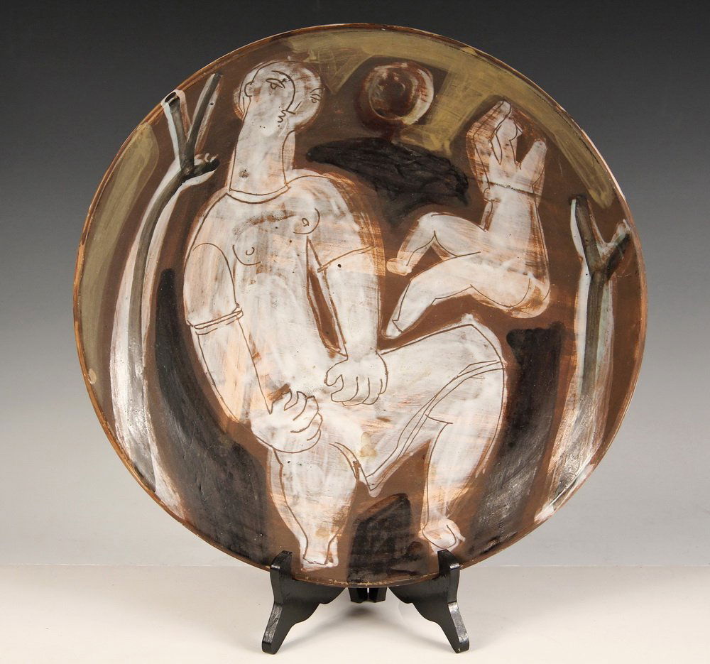 ART POTTERY CHARGER - Redware Charger with Incised: ART POTTERY CHARGER - Redware Charger with Incised Faience Glazes, depicting two women, by Jacques Innocenti (1926-1958), from the studio town of Vallauris (where Picasso worked), circa 1950. Marked o