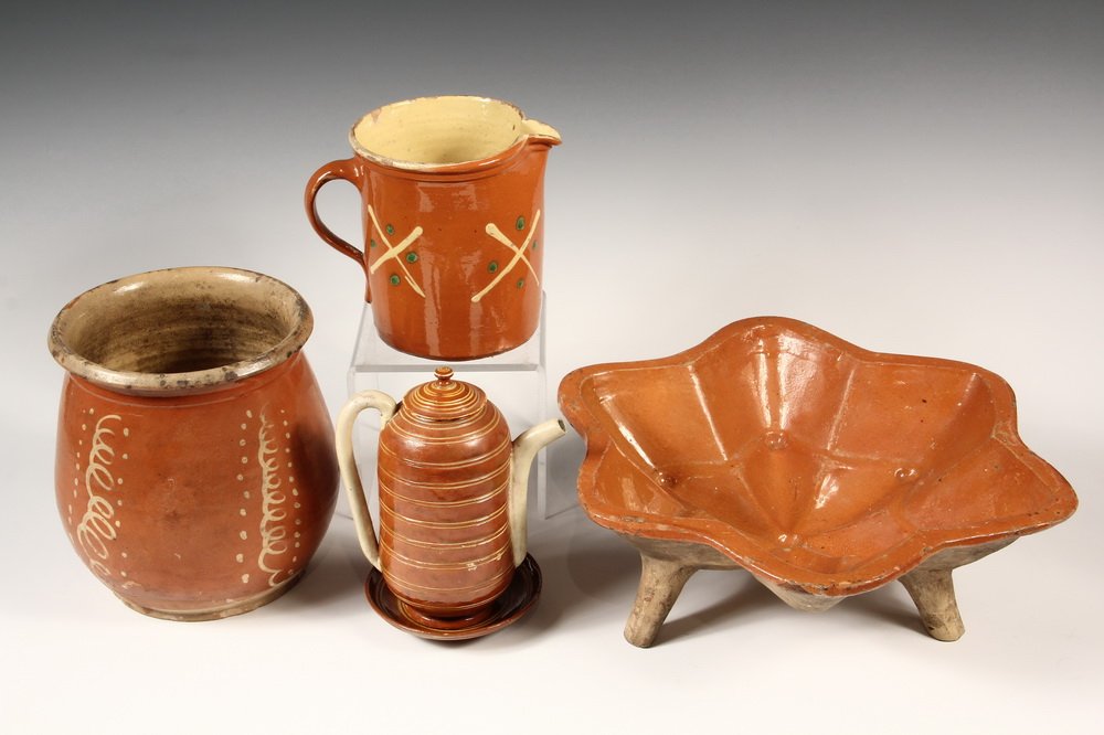 (4 PCS) REDWARE POTTERY - 19th c. Pennsylvania Glazed: (4 PCS) REDWARE POTTERY - 19th c. Pennsylvania Glazed Pottery, including: Footed Star Shaped Food Mold; Barrel Form Bean Pot; Milk Pitcher & Tea Pot with Underplate. 13" diam to 7" tall. Some chips an