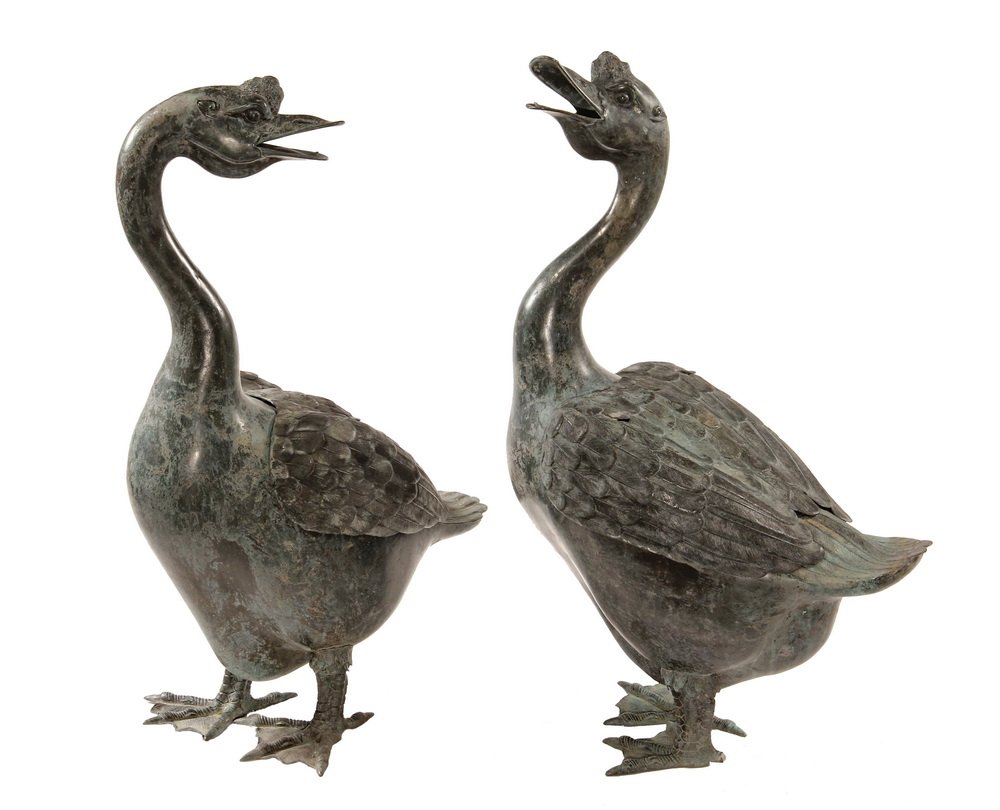 PAIR OF CHINESE BRONZE SCULPTURES - Life-Sized Garden: PAIR OF CHINESE BRONZE SCULPTURES - Life-Sized Garden Figures of Swan Geese, 20th c, with lift-off wings, hollow body, very detailed. From the estate of Brooke Astor. 33" tall. Tips of wings gone from