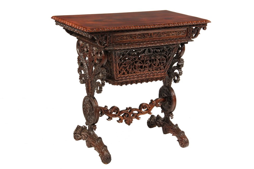 ANGLO-INDIAN LADY'S WORKSTAND - Outstanding Rosewood: ANGLO-INDIAN LADY'S WORKSTAND - Outstanding Rosewood Work Table having a handsomely figured one board top with egg and dart carved edge, vine carved frieze concealing a single shallow drawer fitted wi