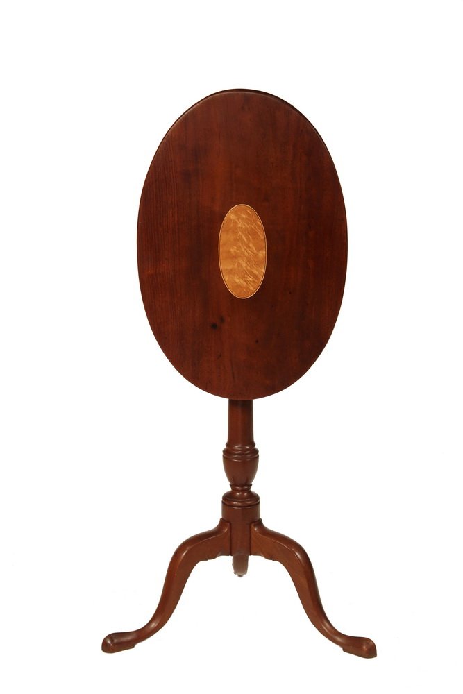 AMERICAN COLONIAL CANDLESTAND - Choice Mahogany Tilt: AMERICAN COLONIAL CANDLESTAND - Choice Mahogany Tilt Top Oval Stand, attributed to the shop of Joseph Short, Newburyport, Mass. Fourth quarter 18th c. Having satin birch inlaid center panel, well-prop