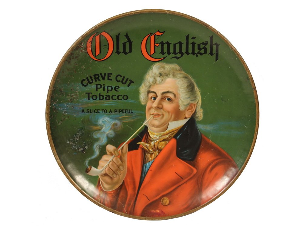 TOBACCO ADVERTISING SIGN - "Old English Curve Cut Pipe: TOBACCO ADVERTISING SIGN - "Old English Curve Cut Pipe Tobacco, A Slice to a Pipeful". Tin lithograph in charger form. Circa 1900. 24" diam. Light scratches, spots of corrosion on left.