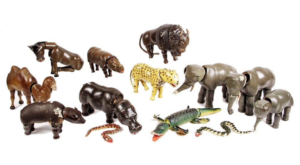 (19) SCHOENHUT CIRCUS TOYS - Articulated Toys, ca 1920,: (19) SCHOENHUT CIRCUS TOYS - Articulated Toys, ca 1920, inc: zebra, camel, bison, lg and sm circus horses, rhino, bear, brown horse, alligator, 2 donkeys, hippo, giraffe, 3 elephants, leopard, 2 snake