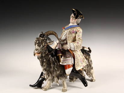 MEISSEN FIGURINE - Large 19th - 20th c. Meissen Figure: MEISSEN FIGURINE - Large 19th - 20th c. Meissen Figure of Count Bruhl's Tailor Astride a Goat and wearing spectacles and tricorn hat. Modeled after a design by Johann-Joachim Kaendler; with blue cross