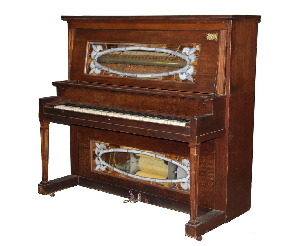 UPRIGHT PLAYER PIANO - Walnut Case, Federal Style, made: UPRIGHT PLAYER PIANO - Walnut Case, Federal Style, made by the Poole Piano Co of Boston, Mass. Serial no 61838, built circa 1912, having stained glass windows above and below the keyboard to reveal th