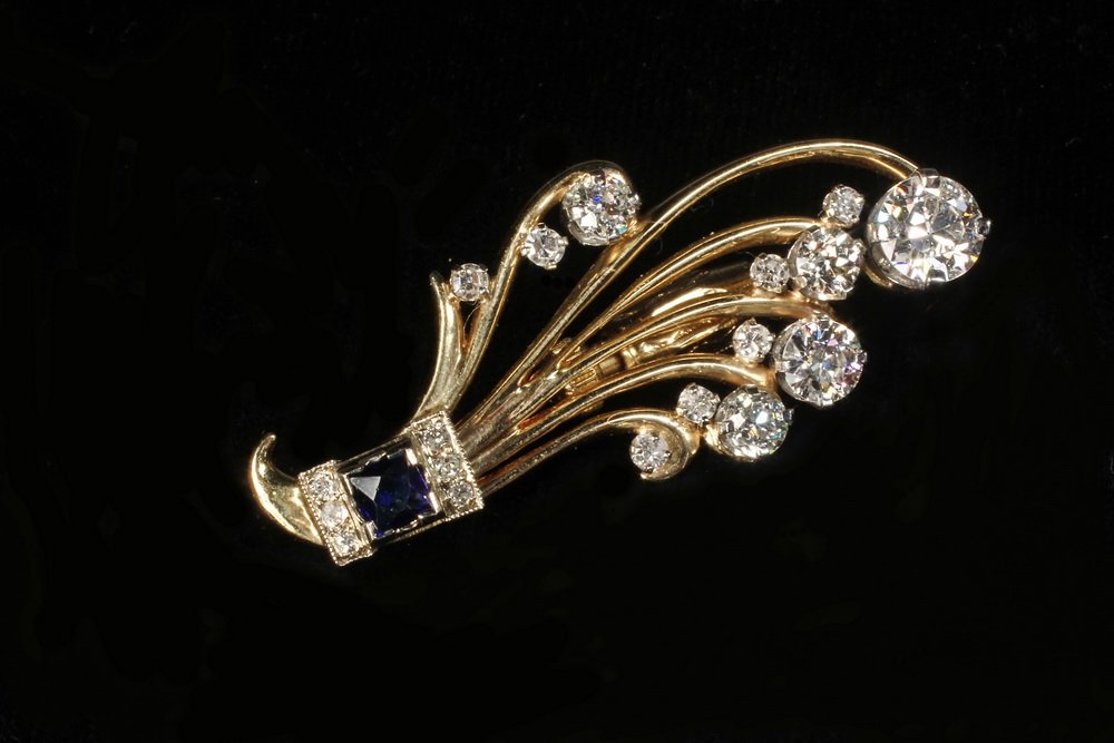 BROOCH - 18K Yellow Gold, Diamond and Sapphire Floral: BROOCH - 18K Yellow Gold, Diamond and Sapphire Floral Spray Brooch, custom designed with curved wires set with old European cut diamonds, single cut diamonds and French cut sapphire. Est. total diamon