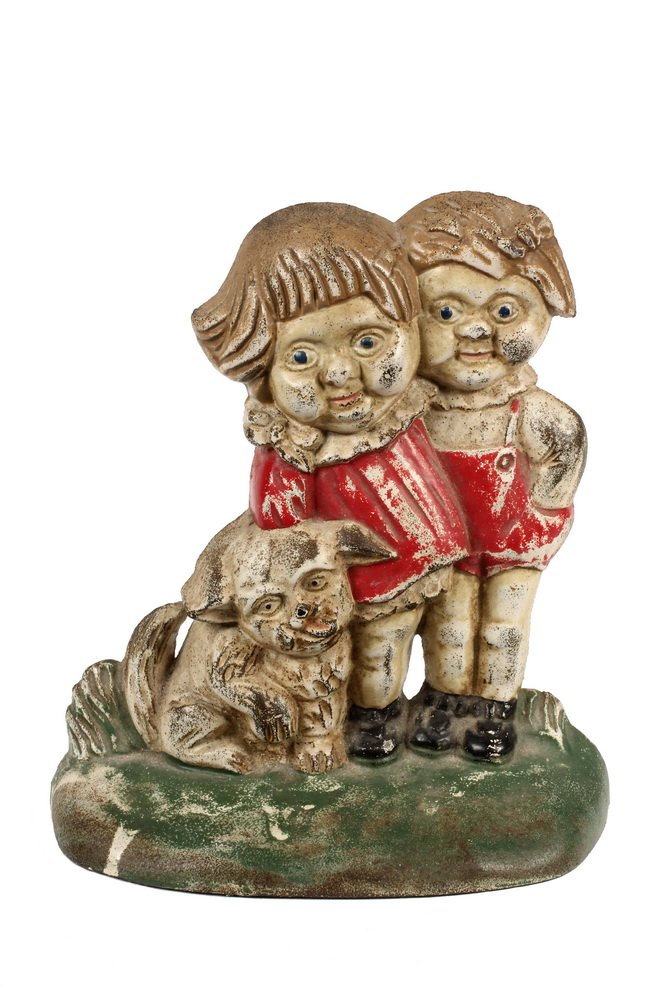 SCARCE FIGURAL DOORSTOP - "Campbell Kids" Cast Iron: SCARCE FIGURAL DOORSTOP - "Campbell Kids" Cast Iron Doorstop, designed by Grace Drayton, circa 1915, in the original paint. Marked "CN" on back. 8 1/2" tall. Some wear to paint.