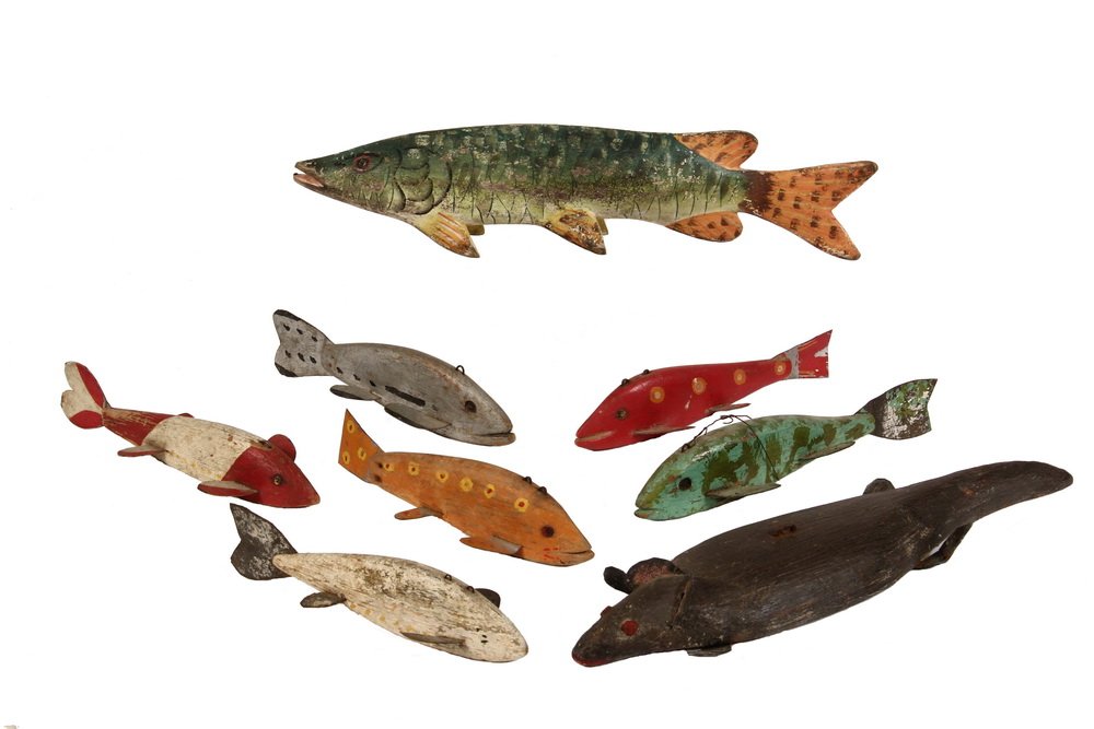 (8) FOLK ART FISHING LURES - Late 19th to early 20th c.: (8) FOLK ART FISHING LURES - Late 19th to early 20th c. New England Lures in painted wood with tin fins, various color and design schemes, including six fish that are about 6" long, one that is 12" lo