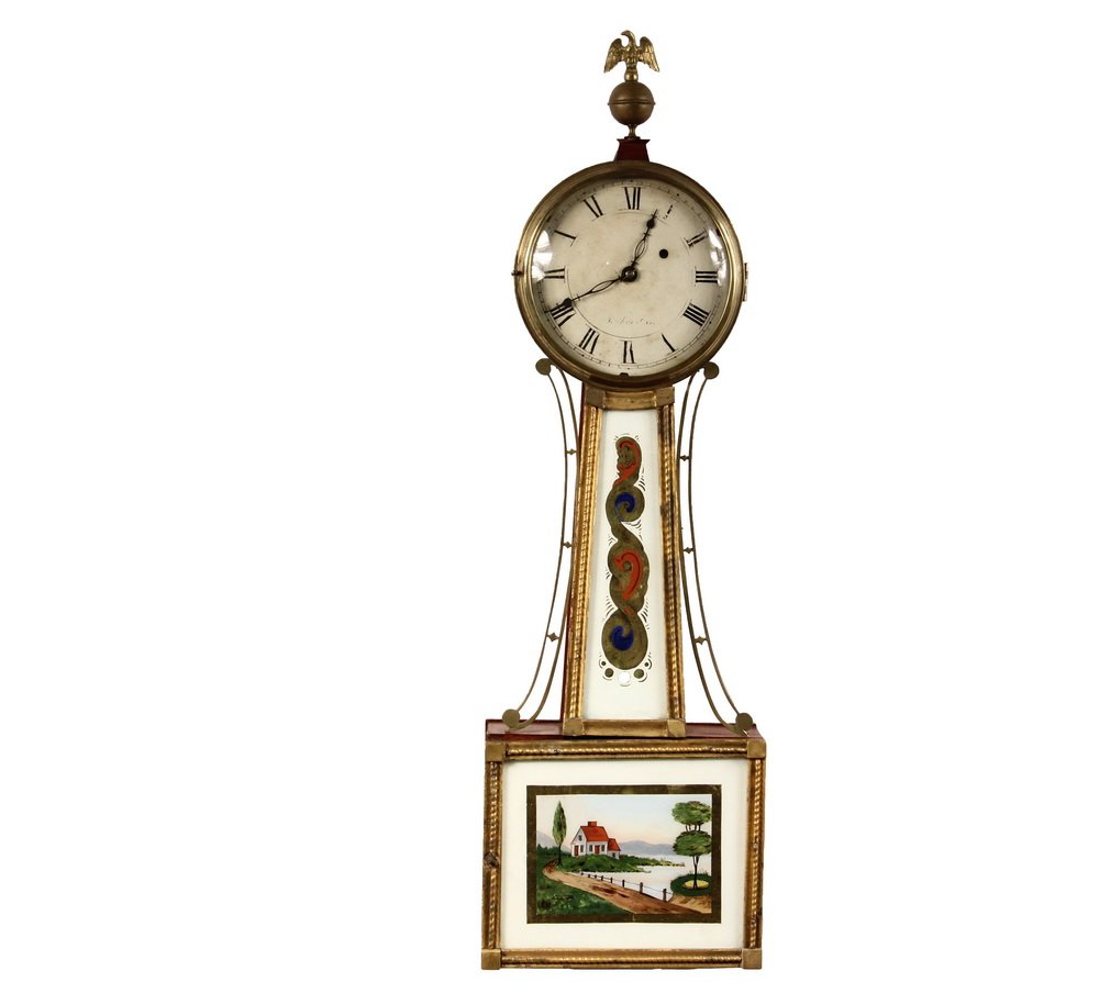 BANJO CLOCK - Period Weight Driven Banjo Clock signed: BANJO CLOCK - Period Weight Driven Banjo Clock signed "A. Chandler" on the painted dial, in mahogany case with brass eagle finials, bezel and brackets, gilt wood tablet frames (replaced tablets), with