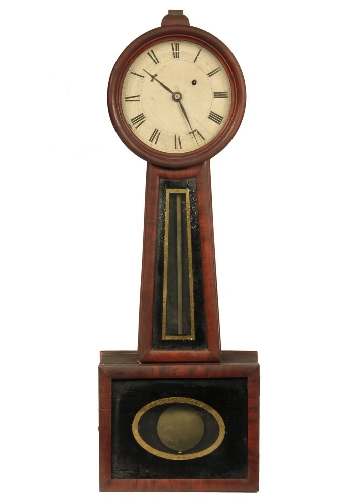 BANJO CLOCK - Mahogany Case, with painted tin dial and: BANJO CLOCK - Mahogany Case, with painted tin dial and eglomise panels, first half 19th c., unmarked. 29 1/2" x 10" x 4". Crazing to face and backpainting.