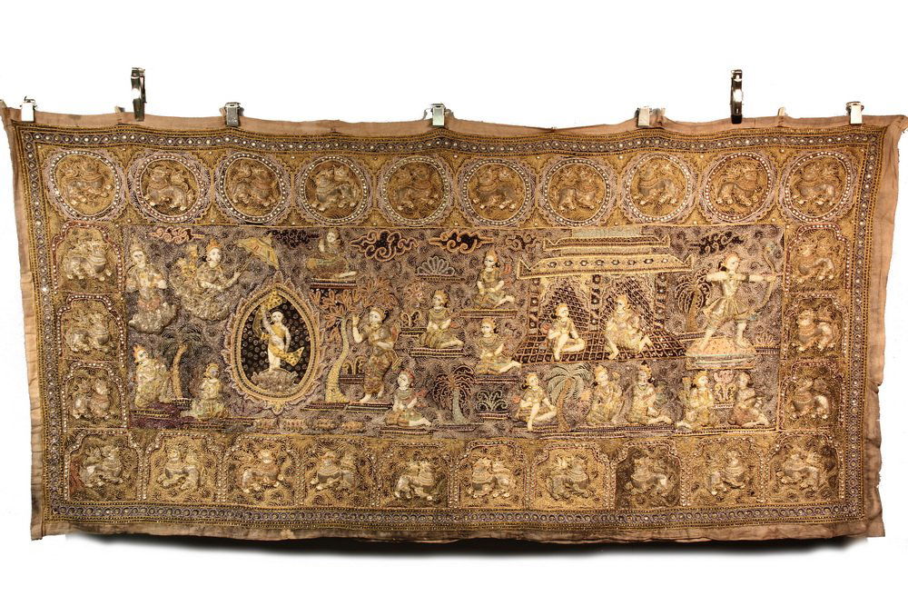 BURMESE TAPESTRY - Late 19th c. Hindu Kalaga, a: BURMESE TAPESTRY - Late 19th c. Hindu Kalaga, a Mandalay Wall Hanging illustrating a garden harem with multiple female figures, archer drawing his bow on right, diety enthroned on left, surrounded by