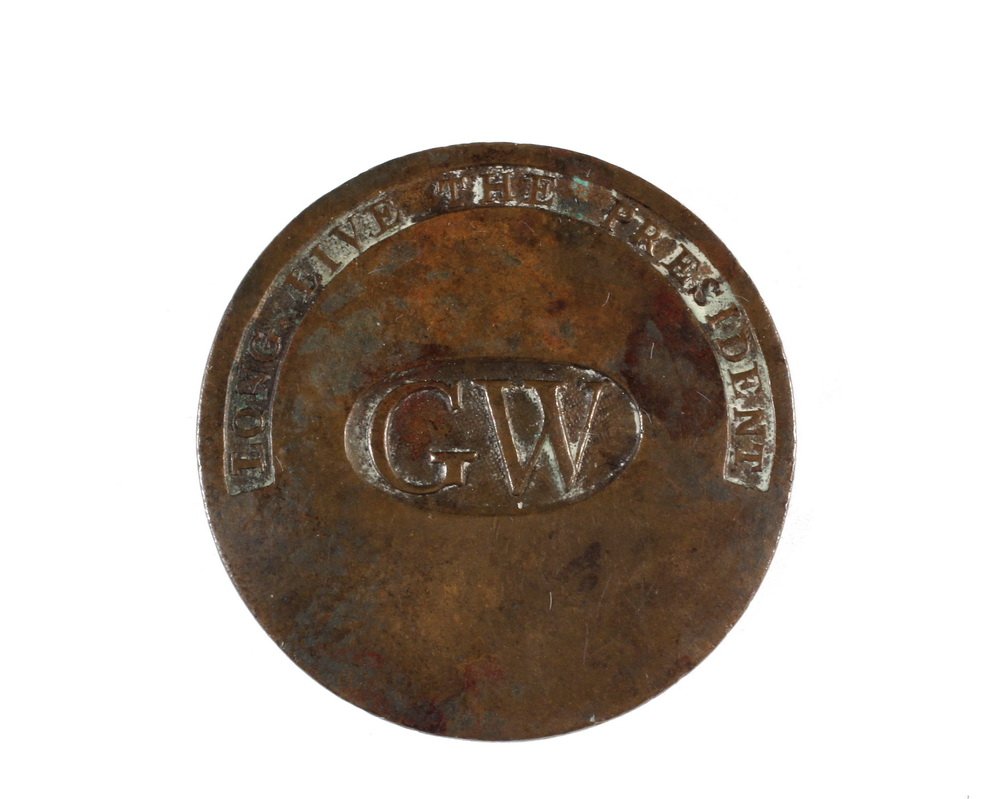 GEORGE WASHINGTON INAUGURAL BUTTON - Rare Original 1789: GEORGE WASHINGTON INAUGURAL BUTTON - Rare Original 1789 Stamped Brass Button reading "G.W., Long Live the President", the 'GW' in an oval at center, the slogan in an arch along top edge, having crossh