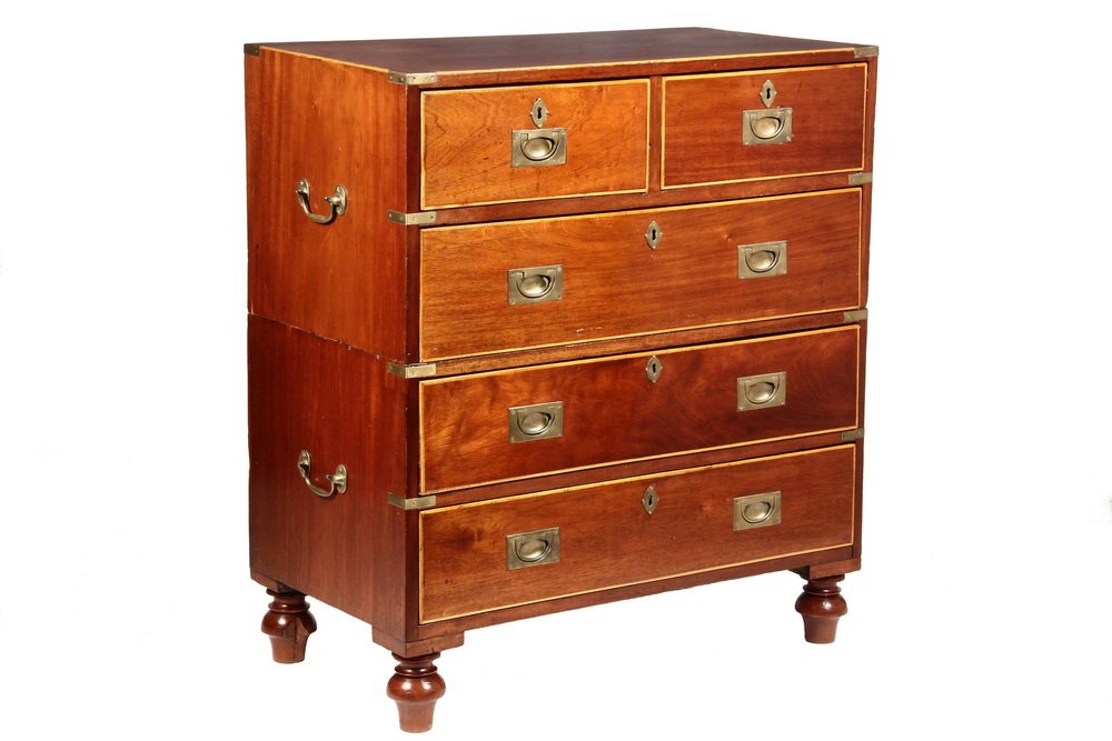 CAMPAIGN CHEST - 19th c. English Two-Part Chest in: CAMPAIGN CHEST - 19th c. English Two-Part Chest in mahogany with boxwood edging, two over three drawers having flush mounted brass pulls, lock escutcheons, drop bail handles on sides, brass corners, s