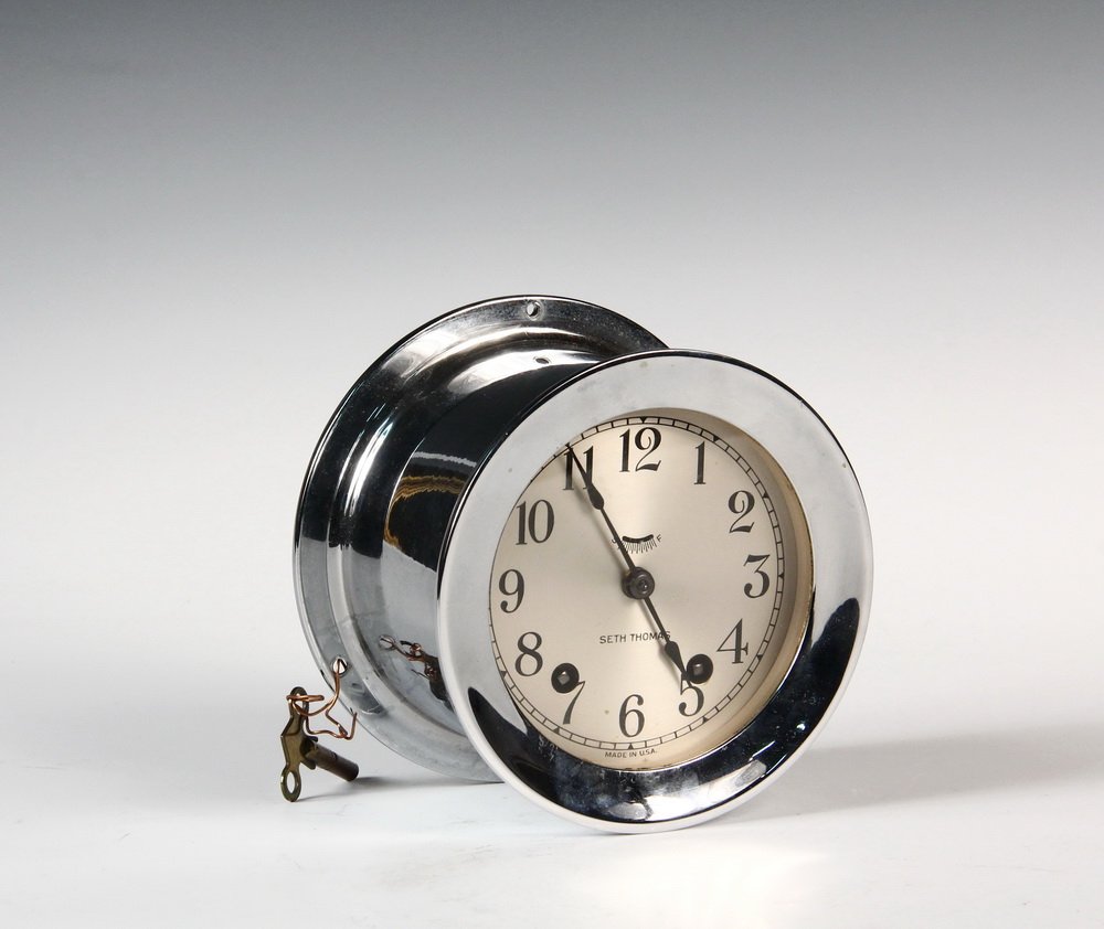 MARINE CLOCK - Seth Thomas 'Mayflower 3' Ship's Clock: MARINE CLOCK - Seth Thomas 'Mayflower 3' Ship's Clock in nickel plated case, with key. 3 1/2" x 5 1/4" diam. Good condition.