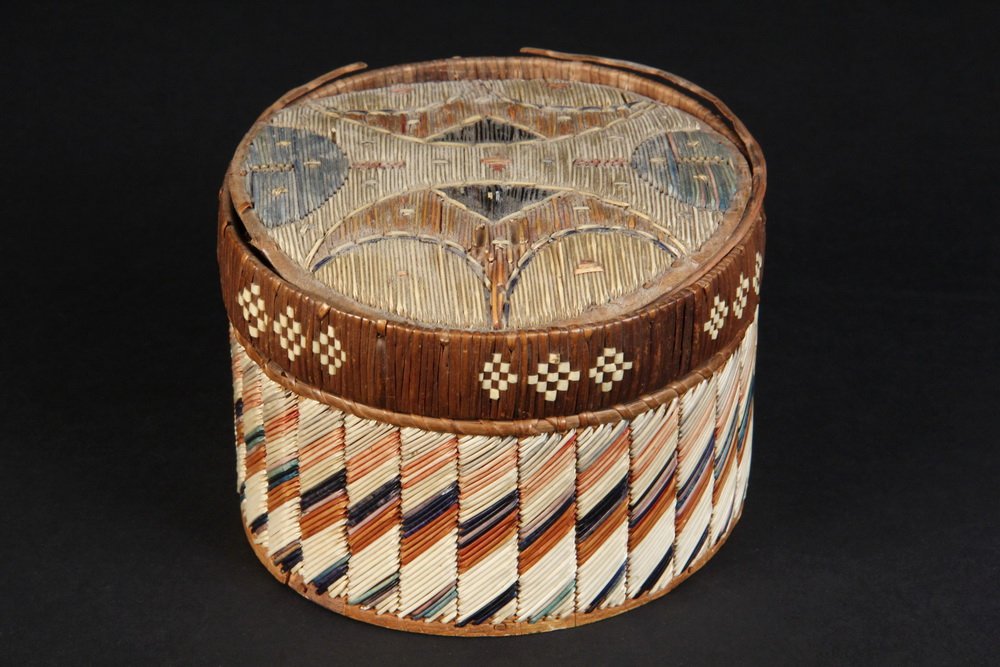 MICMAC QUILLWORK BOX - Late 19th c Quill over Birch: MICMAC QUILLWORK BOX - Late 19th c Quill over Birch Bark Box in round form with lift-off lid, geometric top, dyed spruce root edge to lid with white inset diamonds, half chevron sides, pine bottom, 3