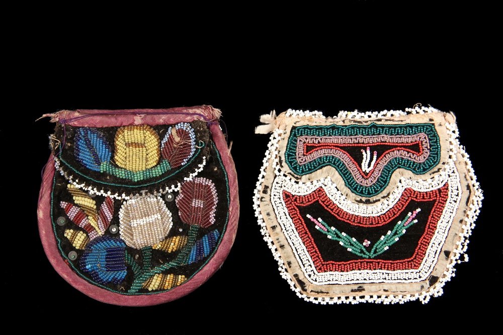 (2) SENECA BEADED POUCHES - Both 19th c, double-sided,: (2) SENECA BEADED POUCHES - Both 19th c, double-sided, the first with rounded bottom and double flaps, in brown velvet, parti-colored floral beadwork, purple binding, 4 1/4" x 4 1/4", minor wear; the