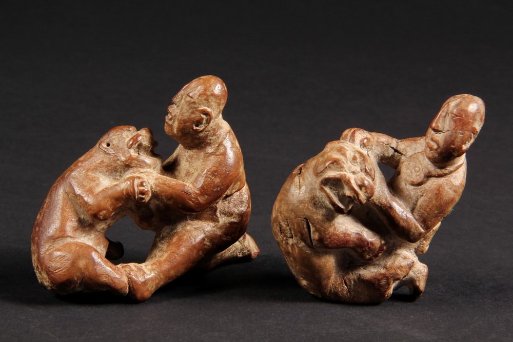 (2) VERY RARE PRE-COLUMBIAN WOOD CARVINGS - Small: (2) VERY RARE PRE-COLUMBIAN WOOD CARVINGS - Small Figures of Men Wrestling Jaguars, fetish forms more commonly having survived in stone, the features similar to the El Manati find, Vera Cruz, 1989, pr