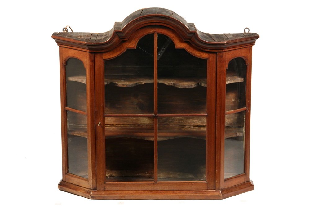 EARLY DUTCH WALL CABINET - Arch-Topped Vitrine with: EARLY DUTCH WALL CABINET - Arch-Topped Vitrine with canted sides, having a molded cornice, four-light door, flanked by two-light faces, all with molded frame and mullions, containing three thin shaped