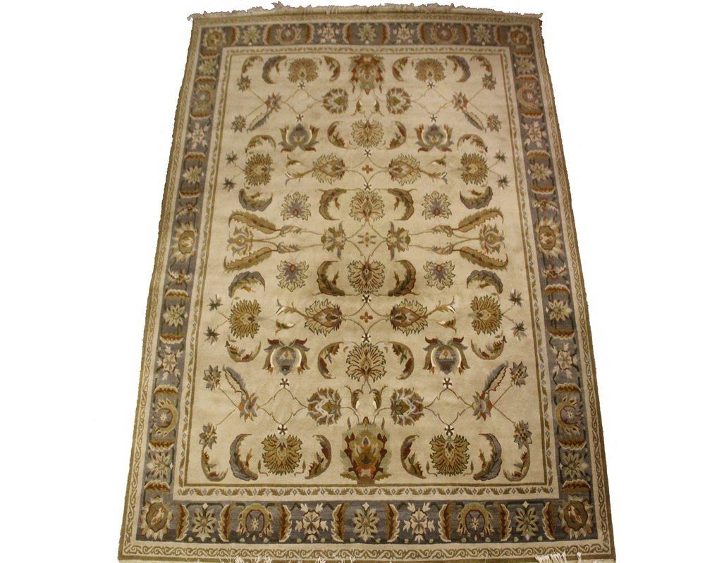 NEPALESE CARPET - 7'11" x 10'2" - Fine Quality Wool: NEPALESE CARPET - 7'11" x 10'2" - Fine Quality Wool Rug, the mate of which had a ribbon label from 'Snowland Art Carpet, Intl' but this does not, handmade in Nepal, having a camel field, slate grey bo